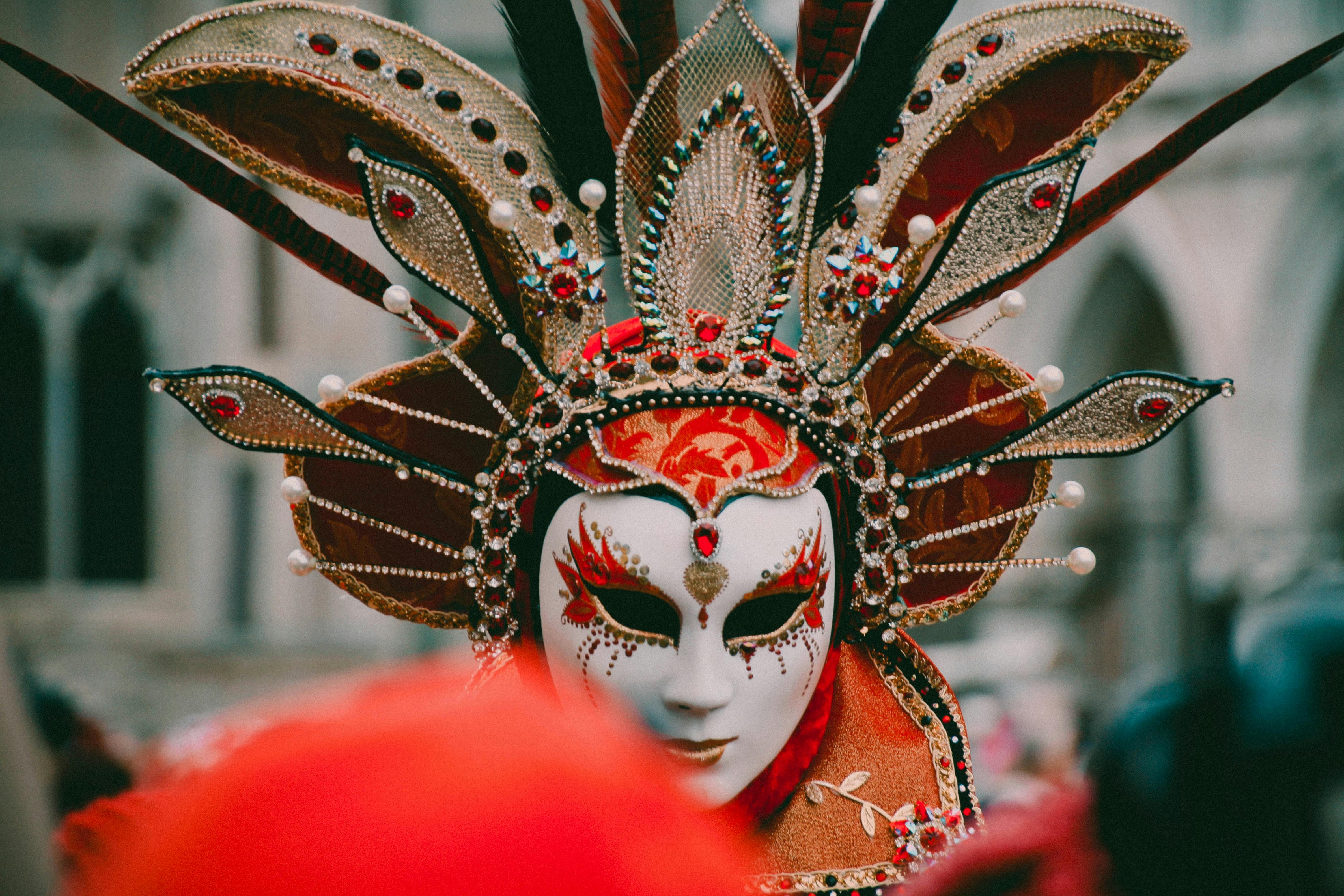 Venetian carnival mask — elaborate gold and red costume